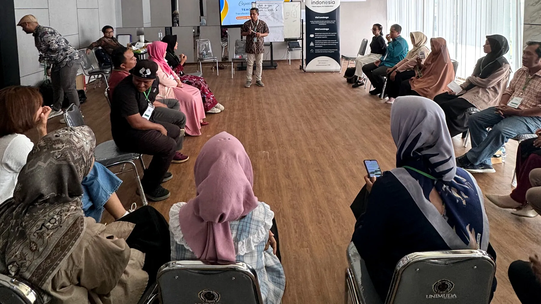 Participants in an Immersia capacity-building session